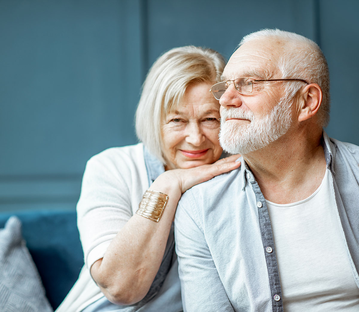 older adult couple sitting together